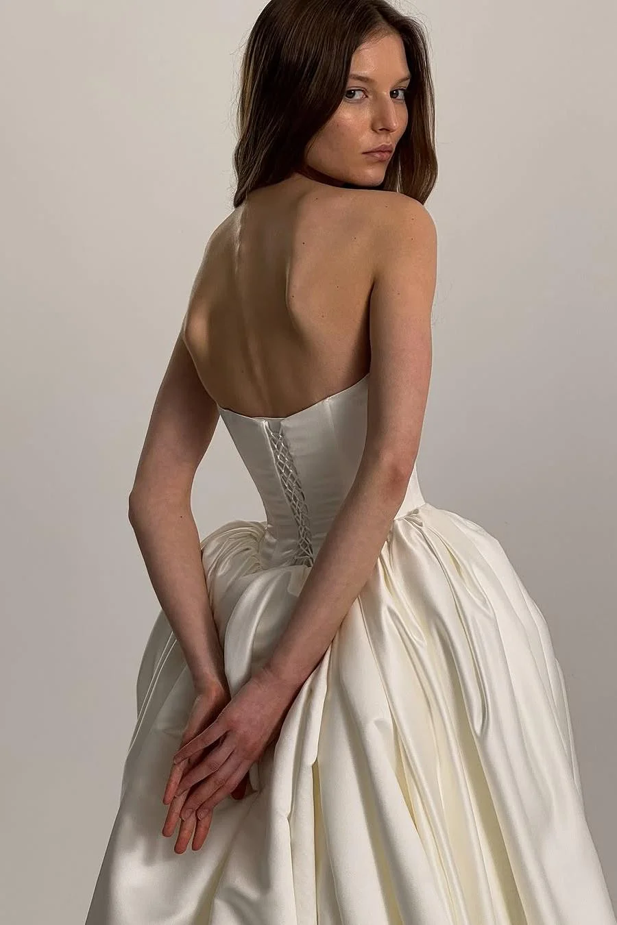 Exquisite Ivory Satin Sleeveless Strapless Long Wedding Dress with Ruffles