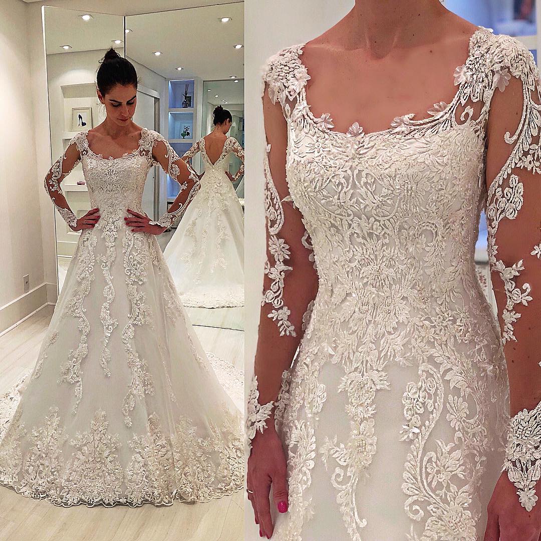 A-line Round Neck Long Sleeve Floor Length Tulle Applique Wedding Dress-showprettydress