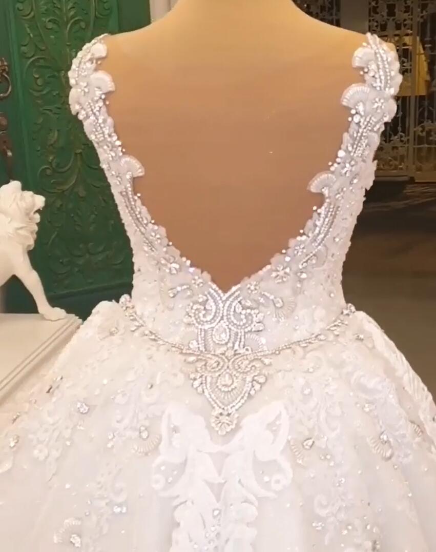 Classy Long Sweetheart Spaghetti Straps Appliques Lace Crystal Backless Wedding Dress-showprettydress